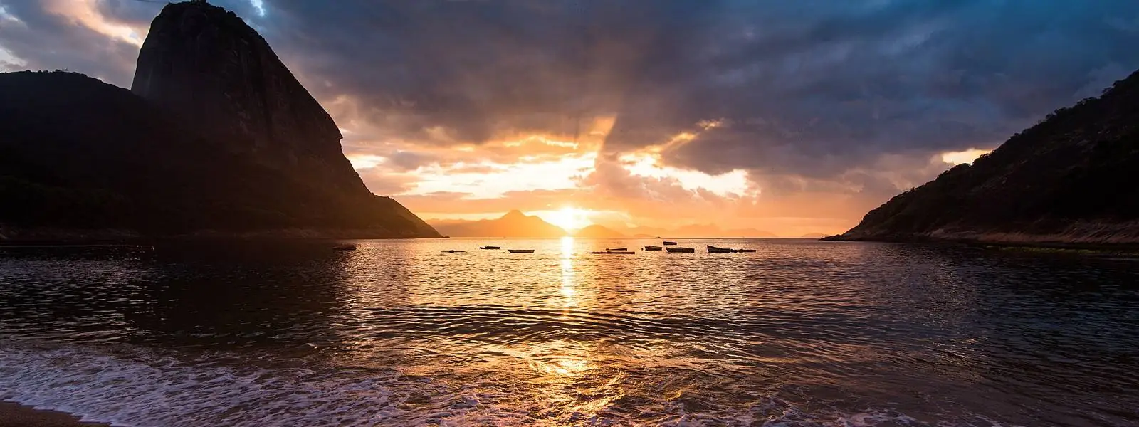 Dramatic Sunrise in Praia Vermelha beach with Sugarloaf Mountain.jpg